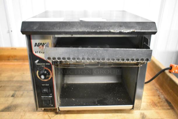 APW Wyott AT EXPRESS-1 Stainless Steel Commercial Countertop Conveyor Toaster Oven. 120 Volts, 1 Phase. Tested and Working! - Image 1 of 6
