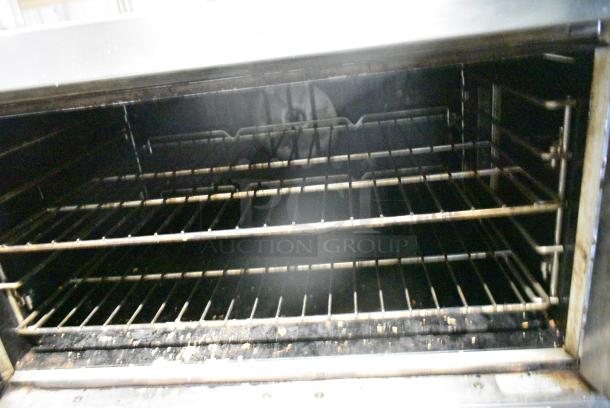Southbend TVGS/12SC Stainless Steel Commercial Natural Gas Powered Convection Oven w/ View Through Doors, Metal Oven Racks and Thermostatic Controls on Commercial Casters. - Image 5 of 8