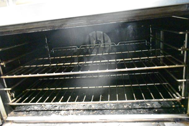 Southbend TVGS/12SC Stainless Steel Commercial Natural Gas Powered Convection Oven w/ View Through Doors, Metal Oven Racks and Thermostatic Controls on Commercial Casters. - Image 6 of 8