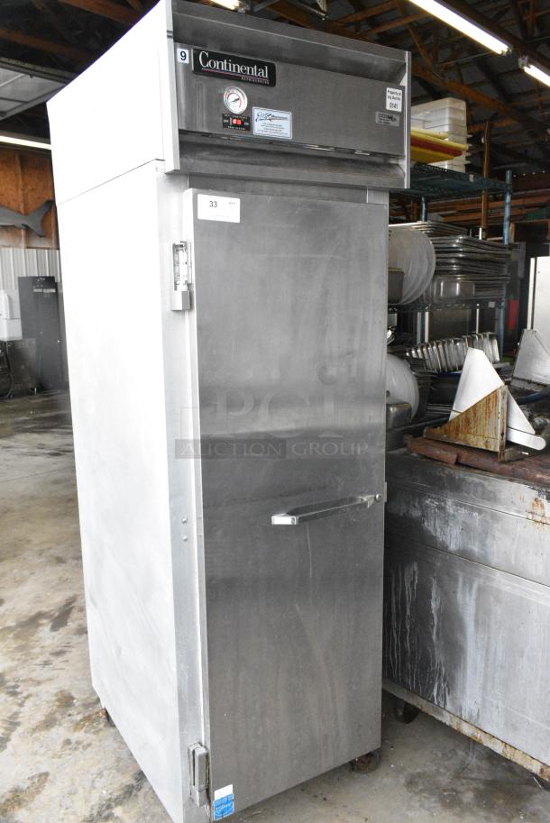 Continental 1R Stainless Steel Commercial Single Door Reach In Cooler on Commercial Casters. 115 Volts, 1 Phase. Tested and Working! - Image 1 of 6