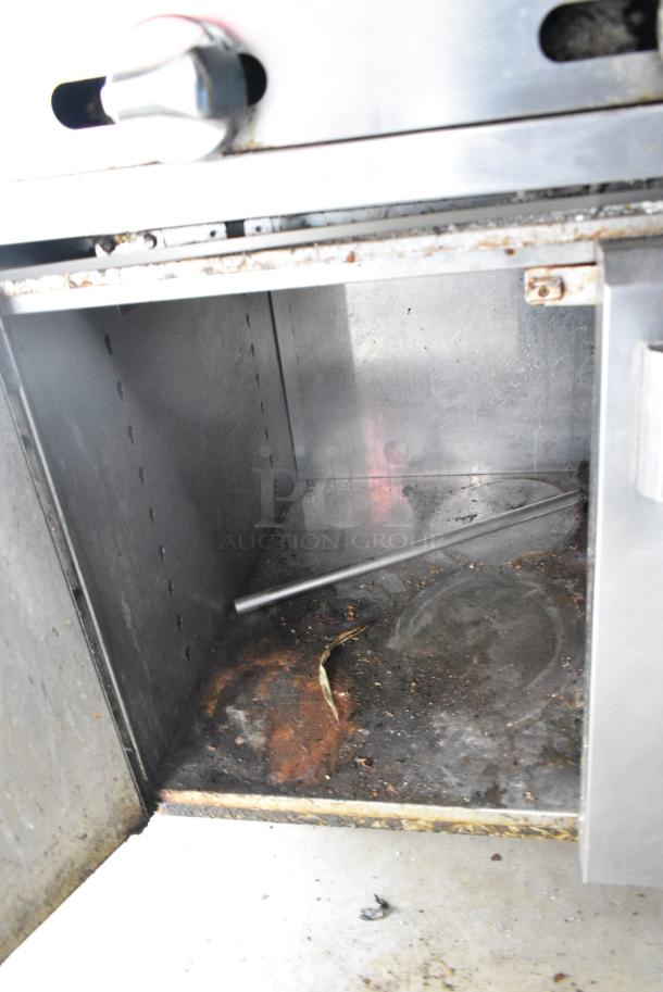 Vulcan VCB136 Stainless Steel Commercial Natural Gas Powered Charbroiler Grill w/ 3 Doors and Under Shelf. - Image 6 of 9