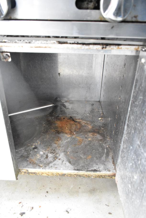 Vulcan VCB136 Stainless Steel Commercial Natural Gas Powered Charbroiler Grill w/ 3 Doors and Under Shelf. - Image 7 of 9