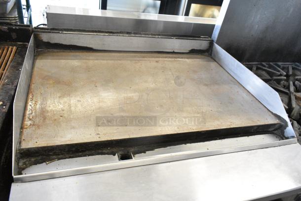 Vulcan Stainless Steel Commercial Natural Gas Powered Flat Top Griddle w/ Oven on Commercial Casters. - Image 6 of 8