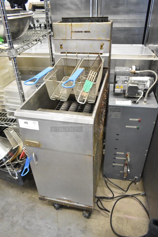 Pitco Frialator 40D Stainless Steel Commercial Floor Style Natural Gas Powered Deep Fat Fryer w/ 2 Metal Fry Baskets on Commercial Casters. 115,000 BTU. - Image 1 of 7