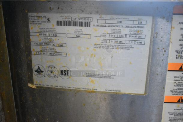 Pitco Frialator 40D Stainless Steel Commercial Floor Style Natural Gas Powered Deep Fat Fryer w/ 2 Metal Fry Baskets on Commercial Casters. 115,000 BTU. - Image 7 of 7
