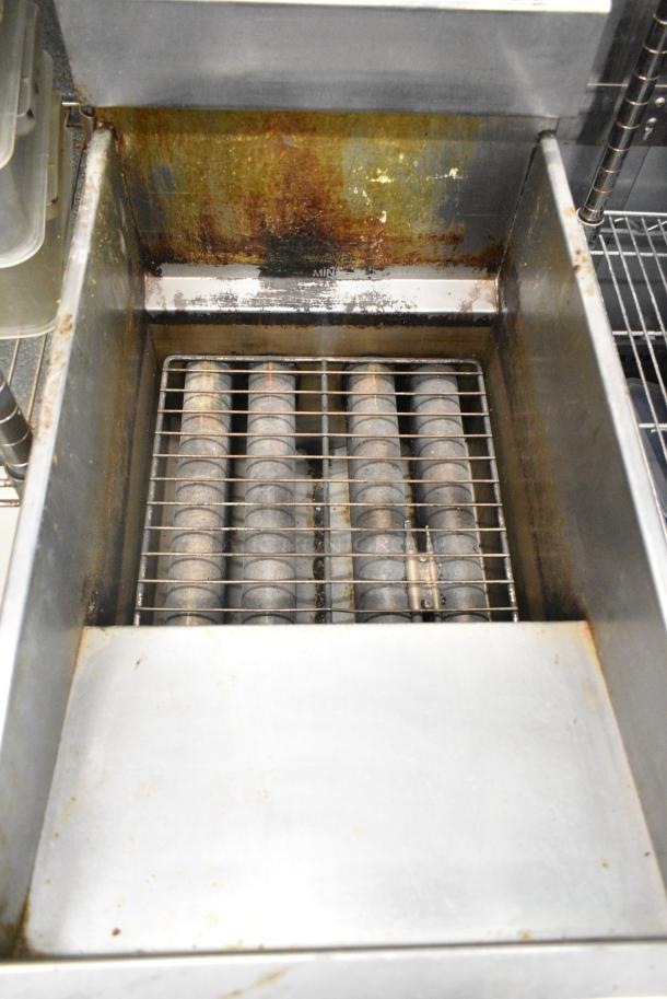 Pitco Frialator 40D Stainless Steel Commercial Floor Style Natural Gas Powered Deep Fat Fryer w/ 2 Metal Fry Baskets on Commercial Casters. 115,000 BTU. - Image 7 of 9