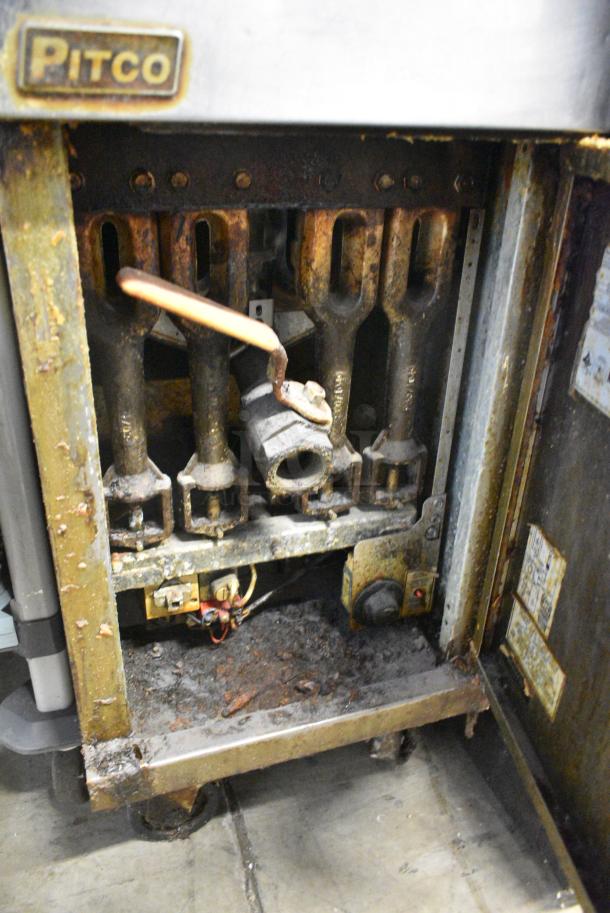 Pitco Frialator 40D Stainless Steel Commercial Floor Style Natural Gas Powered Deep Fat Fryer w/ 1 Metal Fry Basket on Commercial Casters. 115,000 BTU. - Image 6 of 7