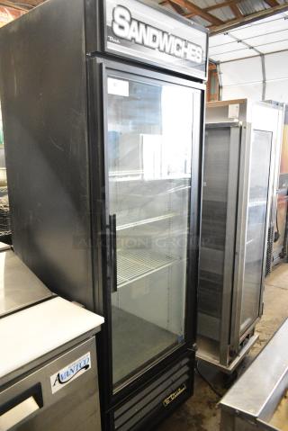 True GDM-23 ENERGY STAR Metal Commercial Single Door Reach In Cooler Merchandiser w/ Poly Coated Racks on Commercial Casters. 115 Volts, 1 Phase. Tested and Working!