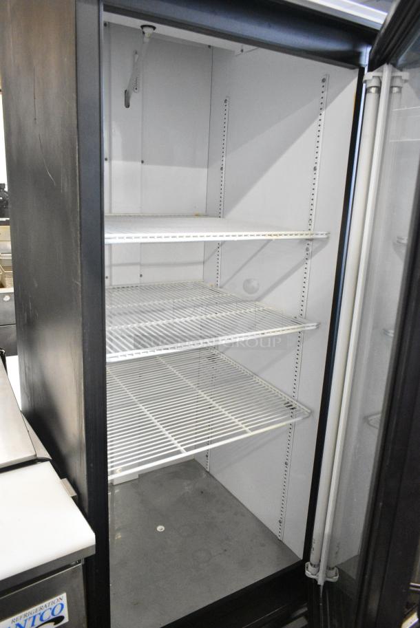 True GDM-23 ENERGY STAR Metal Commercial Single Door Reach In Cooler Merchandiser w/ Poly Coated Racks on Commercial Casters. 115 Volts, 1 Phase. Tested and Working! - Image 4 of 5