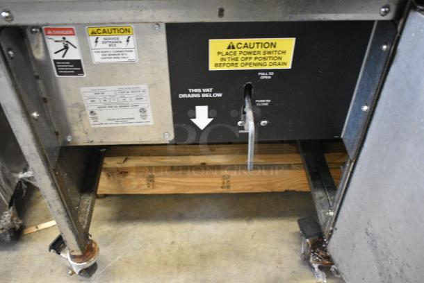 Giles EOF-24 Stainless Steel Commercial Electric Powered 3 Bay Deep Fat Fryer w/ Dumping Station on Commercial Casters. 480 Volts, 3 Phase. - Image 9 of 16