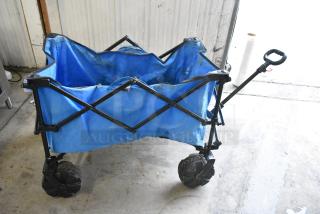 Blue Collapsible Wagon on Casters.