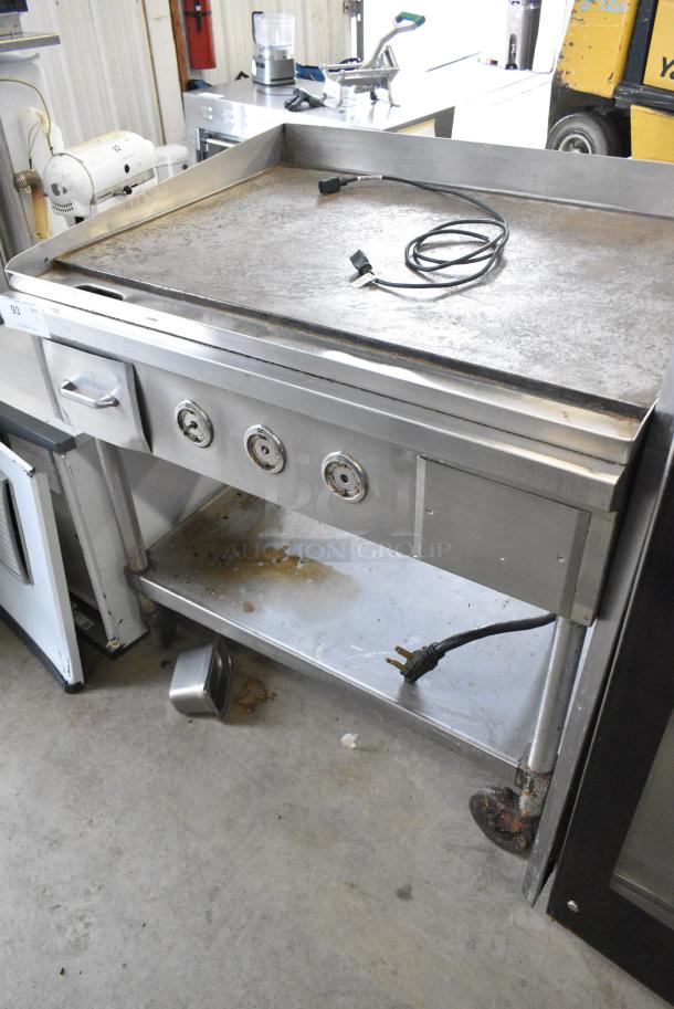 Stainless Steel Commercial Flat Top Griddle w/ Under Shelf on Commercial Casters. 220-240 Volts, 3 Phase. - Image 1 of 8