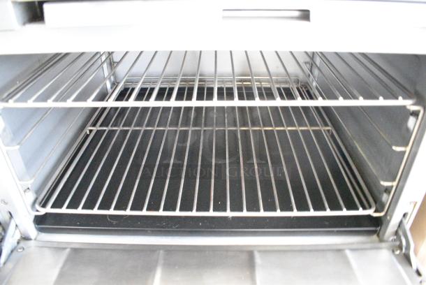 Stainless Steel Commercial Natural Gas Powered 6 Burner Range w/ Right Side Flat Top Griddle, 2 Ovens and Back Splash. - Image 8 of 10