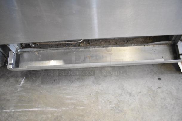 Stainless Steel Commercial Natural Gas Powered 6 Burner Range w/ Right Side Flat Top Griddle, 2 Ovens and Back Splash. - Image 9 of 10