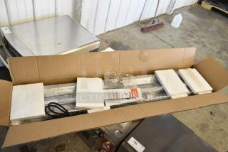 BRAND NEW SCRATCH AND DENT! ServIt 423SW54TLCPA 54" Lighted Strip Warmer with Single Toggle Control and Cord . 120 Volts, 1 Phase.