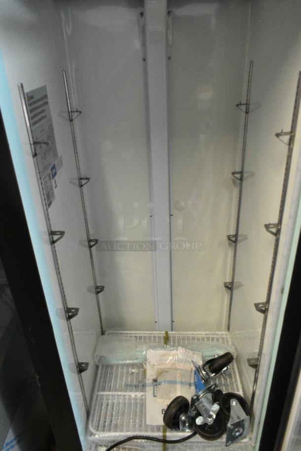BRAND NEW SCRATCH AND DENT! 2023 Avantco 178GDC12FHCB Metal Commercial Single Door Reach In Cooler Merchandiser w/ Commercial Casters. 115 Volts, 1 Phase. Tested and Working! - Image 4 of 7