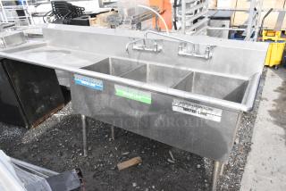 Stainless Steel 3 Bay Sink w/ Left Side Drain Board, 2 Faucets and 2 Handle Sets.