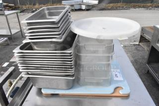 22 Various Metal Items Including Cutting Boards, Stainless Steel Drop In Bins and Poly Bins. 22 Times Your Bid!