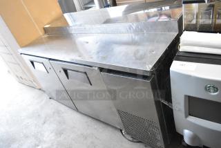 True TPP-67 Stainless Steel Commercial 2 Door Work Top Cooler. 115 Volts, 1 Phase. Tested and Powers On But Does Not Get Cold