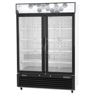 BRAND NEW SCRATCH AND DENT! 2024 Migali C-49FM-HCe Metal Commercial 2 Door Reach In Freezer Merchandiser w/ Poly Coated Racks on Commercial Casters. 115 Volts, 1 Phase. Serial C-49FM-HCe240430C014. Tested and Working!