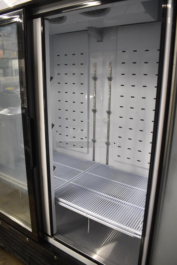 BRAND NEW SCRATCH AND DENT! 2024 Migali C-49FM-HCe Metal Commercial 2 Door Reach In Freezer Merchandiser w/ Poly Coated Racks on Commercial Casters. 115 Volts, 1 Phase. Serial C-49FM-HCe240430C014. Tested and Working! - Image 5 of 7