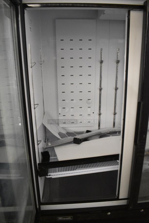 BRAND NEW SCRATCH AND DENT! 2024 Migali C-72FM-HC Metal Commercial 3 Door Freezer Merchandiser w/ Poly Coated Racks. 115/208-230 Volts, 1 Phase. Serial C-72FM-HCN6NT023. - Image 4 of 8