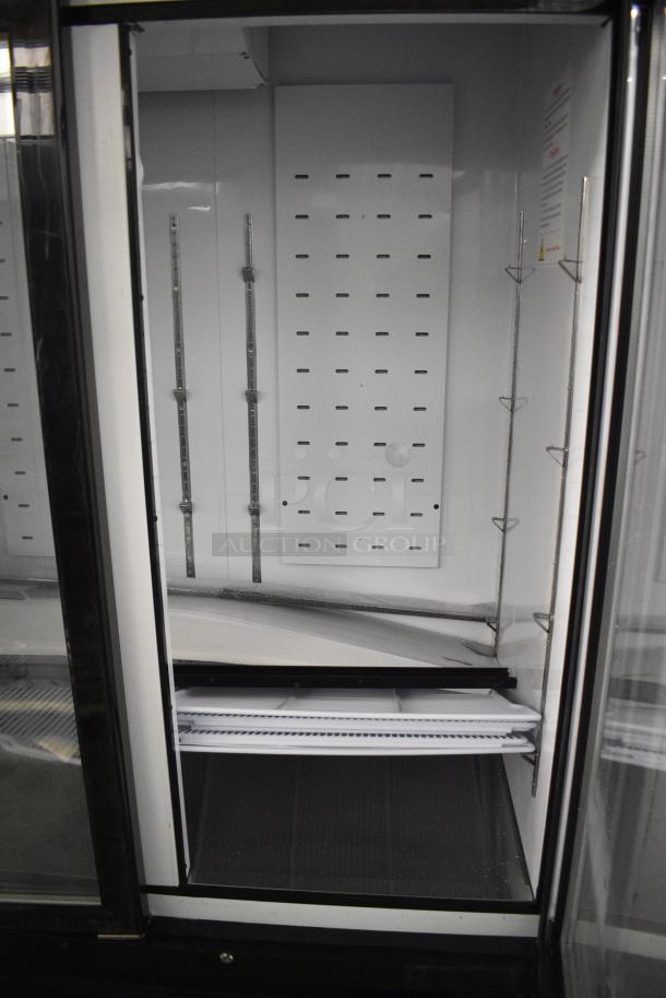 BRAND NEW SCRATCH AND DENT! 2024 Migali C-72FM-HC Metal Commercial 3 Door Freezer Merchandiser w/ Poly Coated Racks. 115/208-230 Volts, 1 Phase. Serial C-72FM-HCN6NT023. - Image 6 of 8