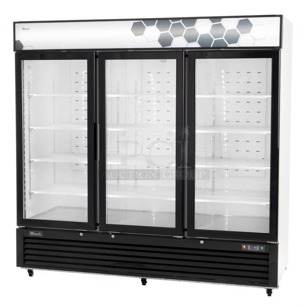 BRAND NEW SCRATCH AND DENT! 2024 Migali C-72FM-HC Metal Commercial 3 Door Freezer Merchandiser w/ Poly Coated Racks on Commercial Casters. 115/208-230 Volts, 1 Phase. Serial C-72FM-HCN6NT011. - Image 1 of 9