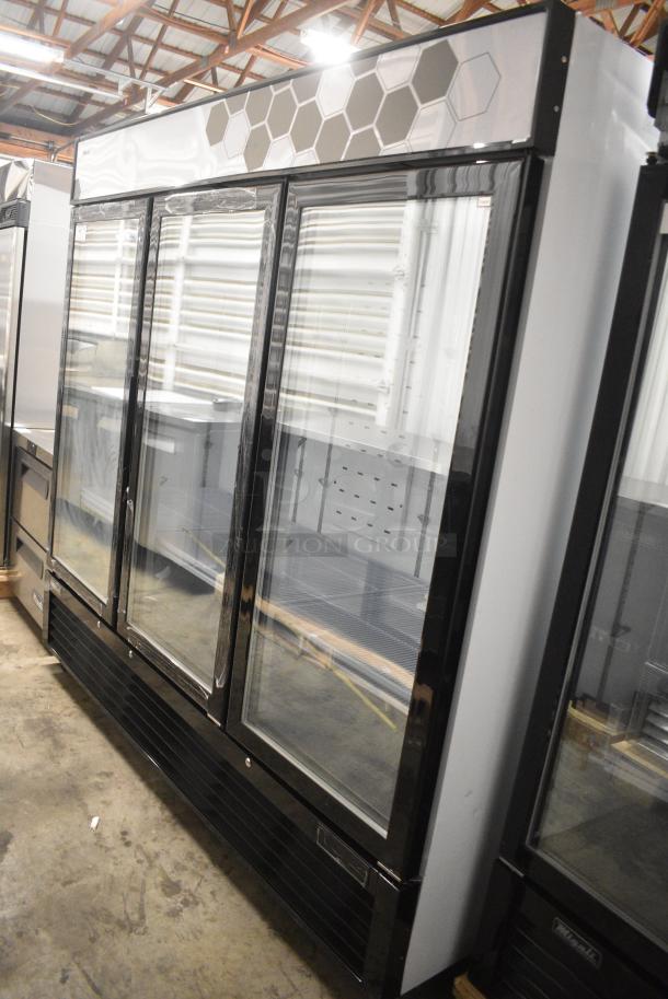 BRAND NEW SCRATCH AND DENT! 2024 Migali C-72FM-HC Metal Commercial 3 Door Freezer Merchandiser w/ Poly Coated Racks on Commercial Casters. 115/208-230 Volts, 1 Phase. Serial C-72FM-HCN6NT011. - Image 3 of 9