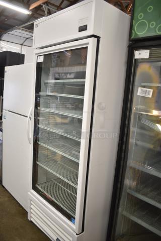 2021 True TSCI-600R-G-PH Metal Commercial Single Door Reach in Cooler Merchandiser w/ Poly Coated Racks. 115 Volts, 1 Phase. Tested and Working!