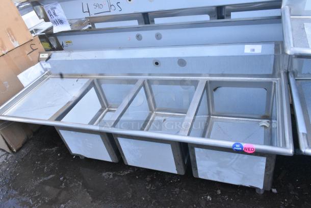 BRAND NEW SCRATCH AND DENT! Regency 600S3182424L 84 1/2" 16-Gauge Stainless Steel Three Compartment Commercial Sink with Cross Bracing and 1 Drainboard - 18" x 24" x 14" Bowls - Left Drainboard. No Legs. - Image 2 of 7