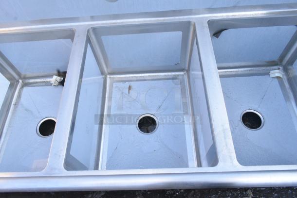 BRAND NEW SCRATCH AND DENT! Regency 600S3182424L 84 1/2" 16-Gauge Stainless Steel Three Compartment Commercial Sink with Cross Bracing and 1 Drainboard - 18" x 24" x 14" Bowls - Left Drainboard. No Legs. - Image 4 of 7