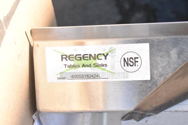 BRAND NEW SCRATCH AND DENT! Regency 600S3182424L 84 1/2" 16-Gauge Stainless Steel Three Compartment Commercial Sink with Cross Bracing and 1 Drainboard - 18" x 24" x 14" Bowls - Left Drainboard. No Legs. - Image 7 of 7