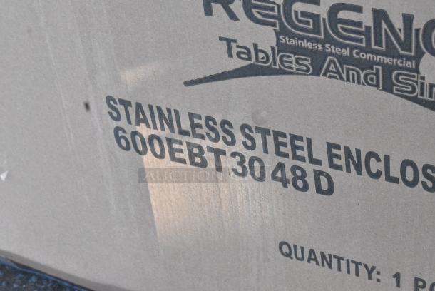 BRAND NEW SCRATCH AND DENT! Regency 600EBT3048D 30" x 48" 16 Gauge Type 304 Stainless Steel Enclosed Base Table with Sliding Doors and Adjustable Midshelf - Image 2 of 2