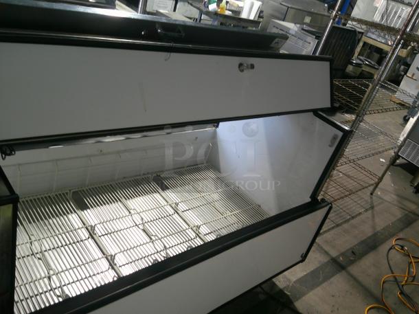 NICE WORKING True TMC-58-S-DS 58 1/4" 2 Sided Reach-In Cooler with Stainless Steel Exterior and Aluminum Interior - Image 3 of 7