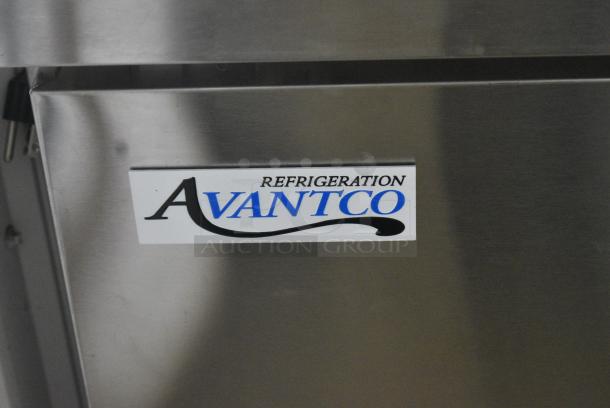 BRAND NEW SCRATCH AND DENT! 2024 Avantco 178SSPPT3 Stainless Steel Commercial 94" 3 Door Refrigerated Pizza Prep Table w/ 4 Drawers and 1 Door on Commercial Casters. 115 Volts, 1 Phase. Tested and Working! - Image 3 of 14