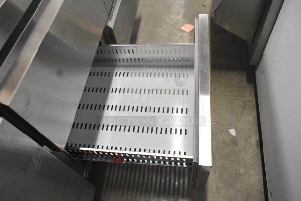 BRAND NEW SCRATCH AND DENT! 2024 Avantco 178SSPPT3 Stainless Steel Commercial 94" 3 Door Refrigerated Pizza Prep Table w/ 4 Drawers and 1 Door on Commercial Casters. 115 Volts, 1 Phase. Tested and Working! - Image 8 of 14