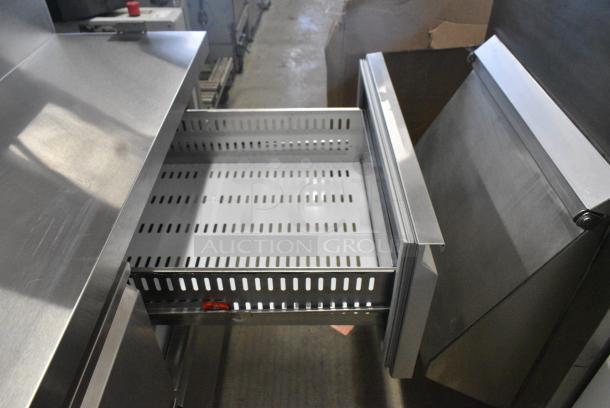 BRAND NEW SCRATCH AND DENT! 2024 Avantco 178SSPPT3 Stainless Steel Commercial 94" 3 Door Refrigerated Pizza Prep Table w/ 4 Drawers and 1 Door on Commercial Casters. 115 Volts, 1 Phase. Tested and Working! - Image 9 of 14