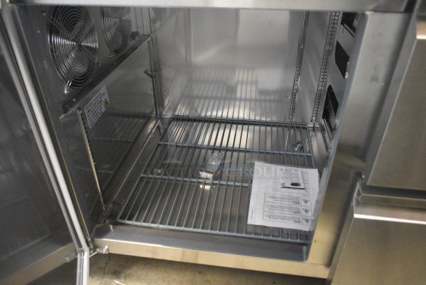 BRAND NEW SCRATCH AND DENT! 2024 Avantco 178SSPPT3 Stainless Steel Commercial 94" 3 Door Refrigerated Pizza Prep Table w/ 4 Drawers and 1 Door on Commercial Casters. 115 Volts, 1 Phase. Tested and Working! - Image 11 of 14