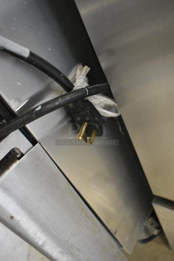 2017 True T-35-HC Stainless Steel Commercial 2 Door Reach in Cooler w/ Poly Coated Racks on Commercial Casters. 115 Volts, 1 Phase. Tested and Working! - Image 6 of 7