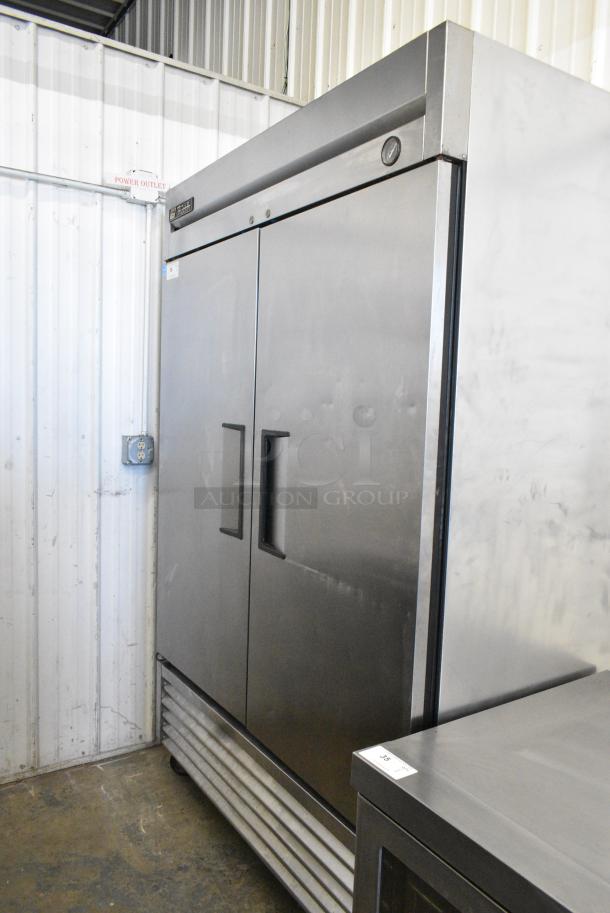 True T-49F Stainless Steel Commercial 2 Door Reach in Freezer w/ Poly Coated Racks on Commercial Casters. 115 Volts, 1 Phase. Tested and Working! - Image 1 of 6