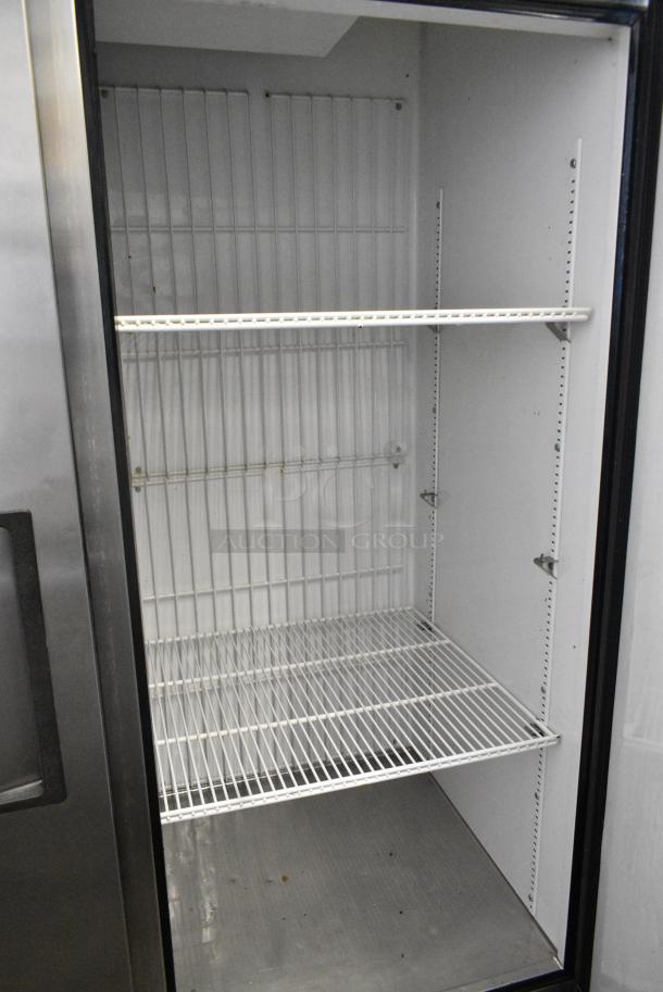 True T-49F Stainless Steel Commercial 2 Door Reach in Freezer w/ Poly Coated Racks on Commercial Casters. 115 Volts, 1 Phase. Tested and Working! - Image 5 of 6