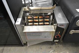 APW Wyott M2000 Stainless Steel Electric Countertop Bun Grill Conveyor Toaster. 208 Volts, 1 Phase.