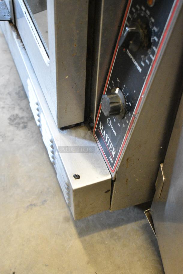 2 Garland Master 200 Stainless Steel Commercial Natural Gas Powered Full Size Convection Oven w/ View Through Doors, Metal Oven Racks and Thermostatic Controls on Commercial Casters. 2 Times Your Bid! - Image 12 of 12