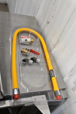 BRAND NEW SCRATCH AND DENT! Regency 600GKM1248 48" Mobile Gas Connector Hose Kit with 2 Elbows, Full Port Valve, Restraining Device, and Quick Disconnect - 1/2"