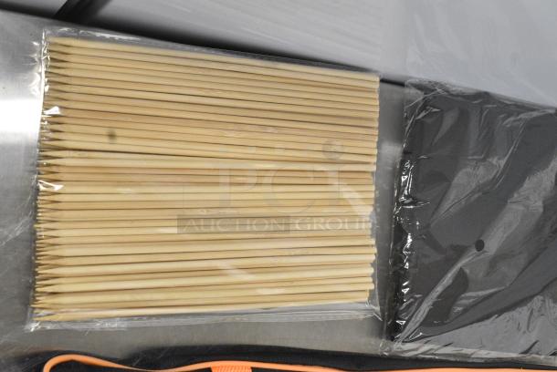 BRAND NEW SCRATCH AND DENT! Lot of 3 Various Items Including Black Bag and Skewers - Image 2 of 4
