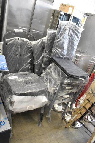 8 BRAND NEW SCRATCH AND DENT! Lancaster Table & Seating 164BNQCRBK Black Pattern Fabric Crown Back Stackable Banquet Chair with Silver Vein Frame. 8 Times Your Bid!