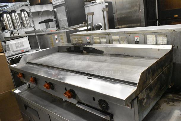 2022 Sierra SRTG60 Stainless Steel Commercial Countertop Natural Gas Powered Flat Top Griddle. - Image 1 of 8