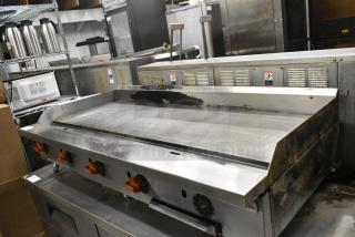 2022 Sierra SRTG60 Stainless Steel Commercial Countertop Natural Gas Powered Flat Top Griddle.