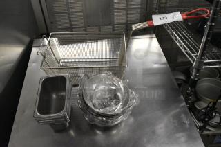 10 Various Metal Items Including Fry Basket, 1/9 Size Drop In Bins and Bowls. 10 Times Your Bid!